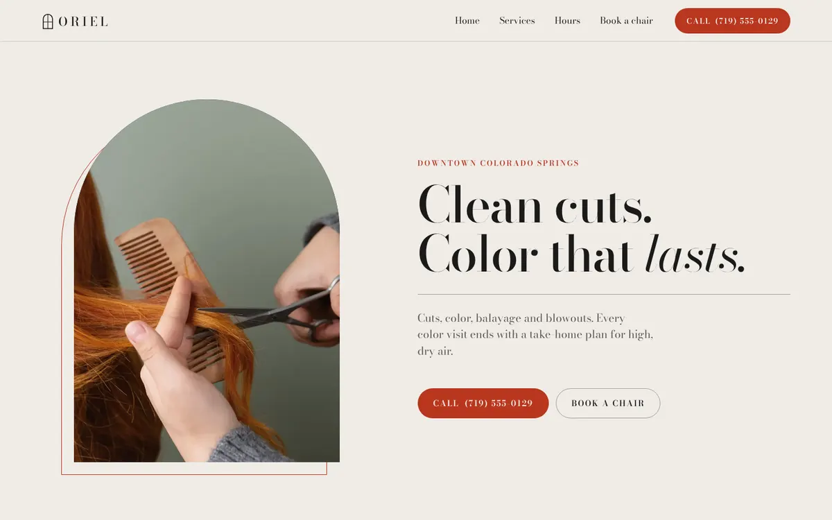 Oriel Hair Studio sample site on a laptop